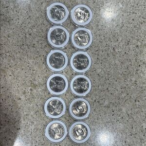 12- Mint condition Half Dollar(Some Toners) Silver Coin Set in Clear Holders